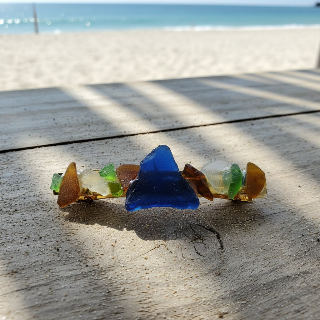 Sea glass barrette on beachside table