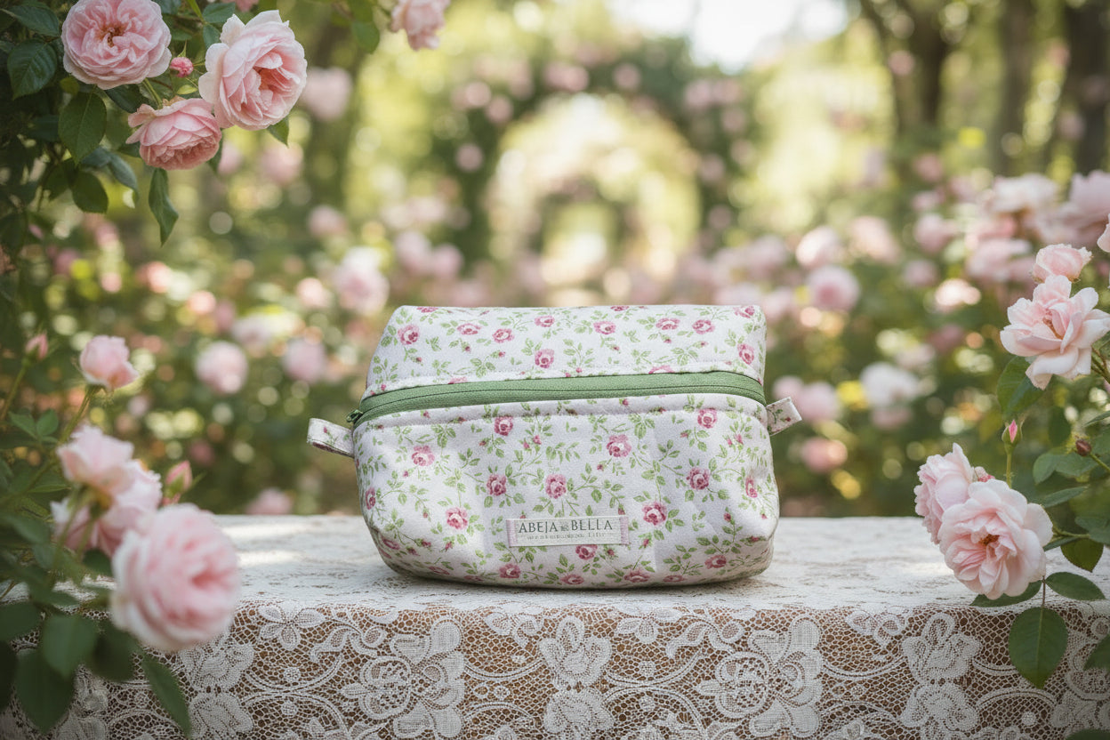 Floral-patterned cosmetic bag on a wooden surface